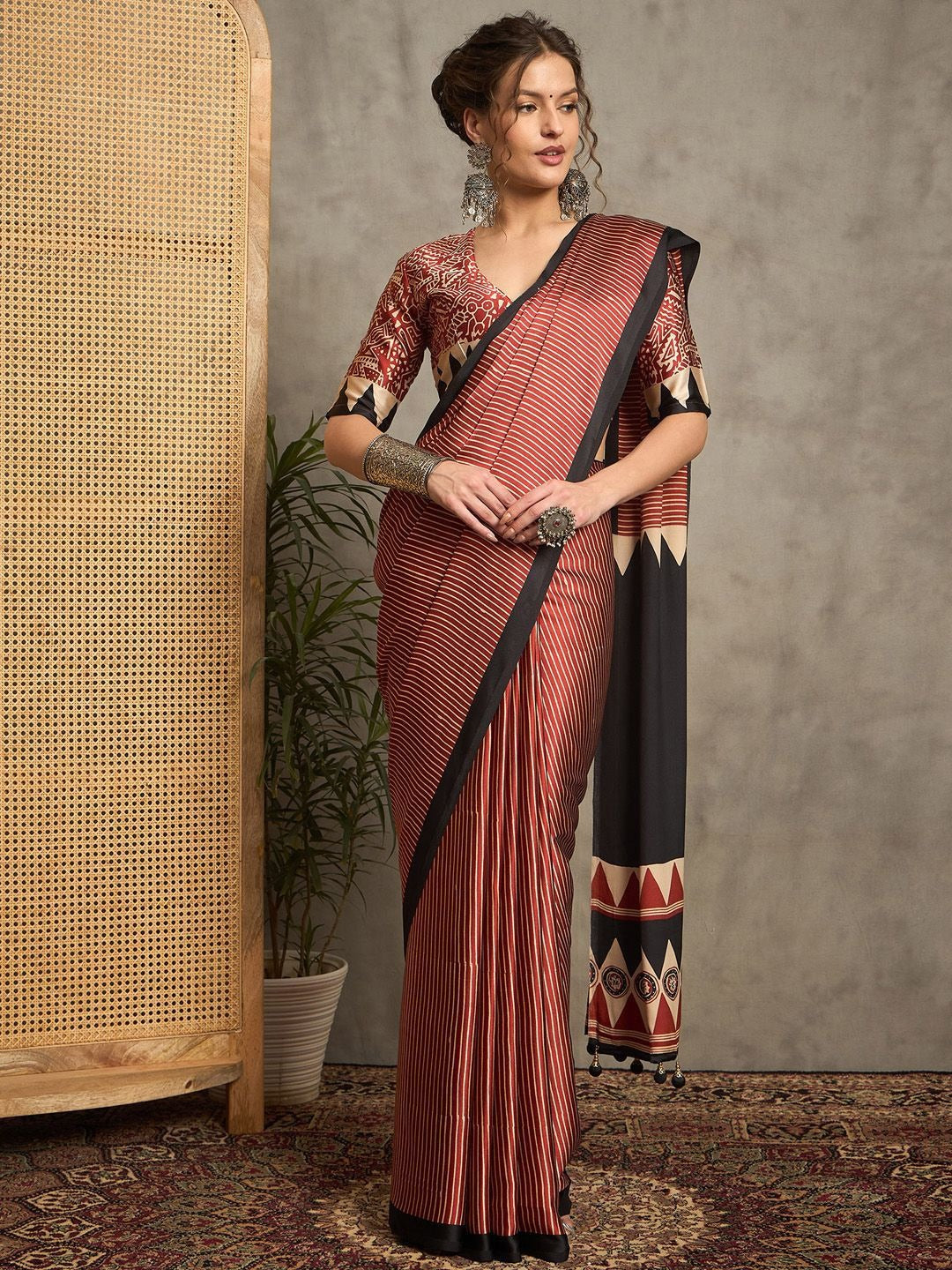 Contemporary Rust & Black Gajji Silk Saree with Tribal-Inspired Border